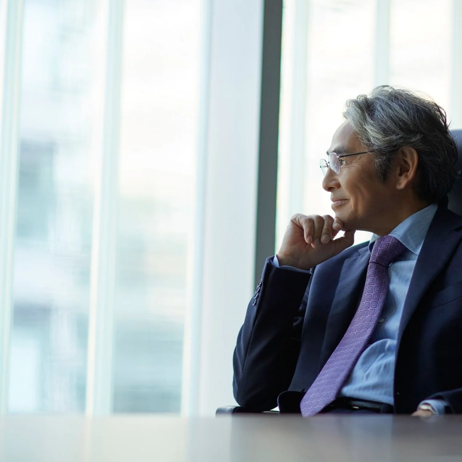 An executive in his fifties reviewing his health data with a physician